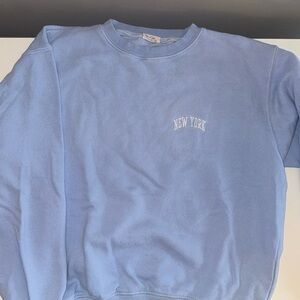 Brandy Melville NY baby blue crew neck